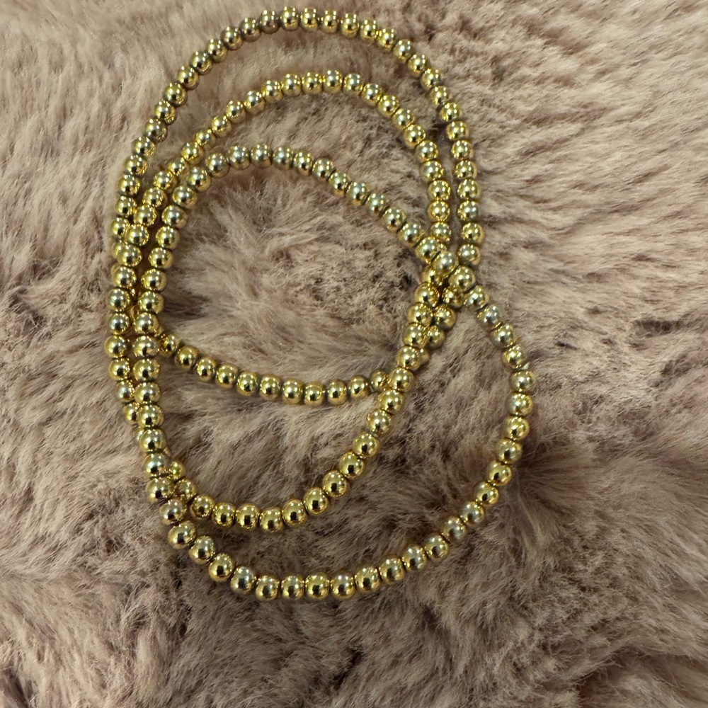 Gold beaded stretch bracelets
